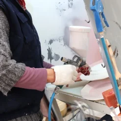 Assiette orange barbotine