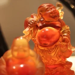 Bouddha debout ambre daum